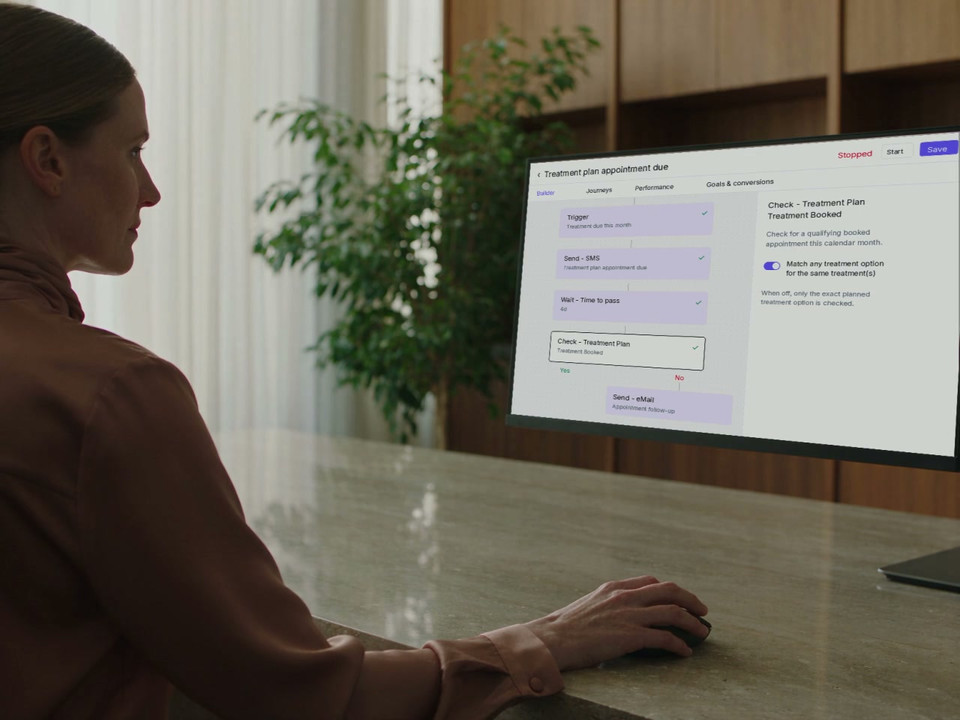 An operations lead reviews the treatment-plan workflow on a desktop monitor